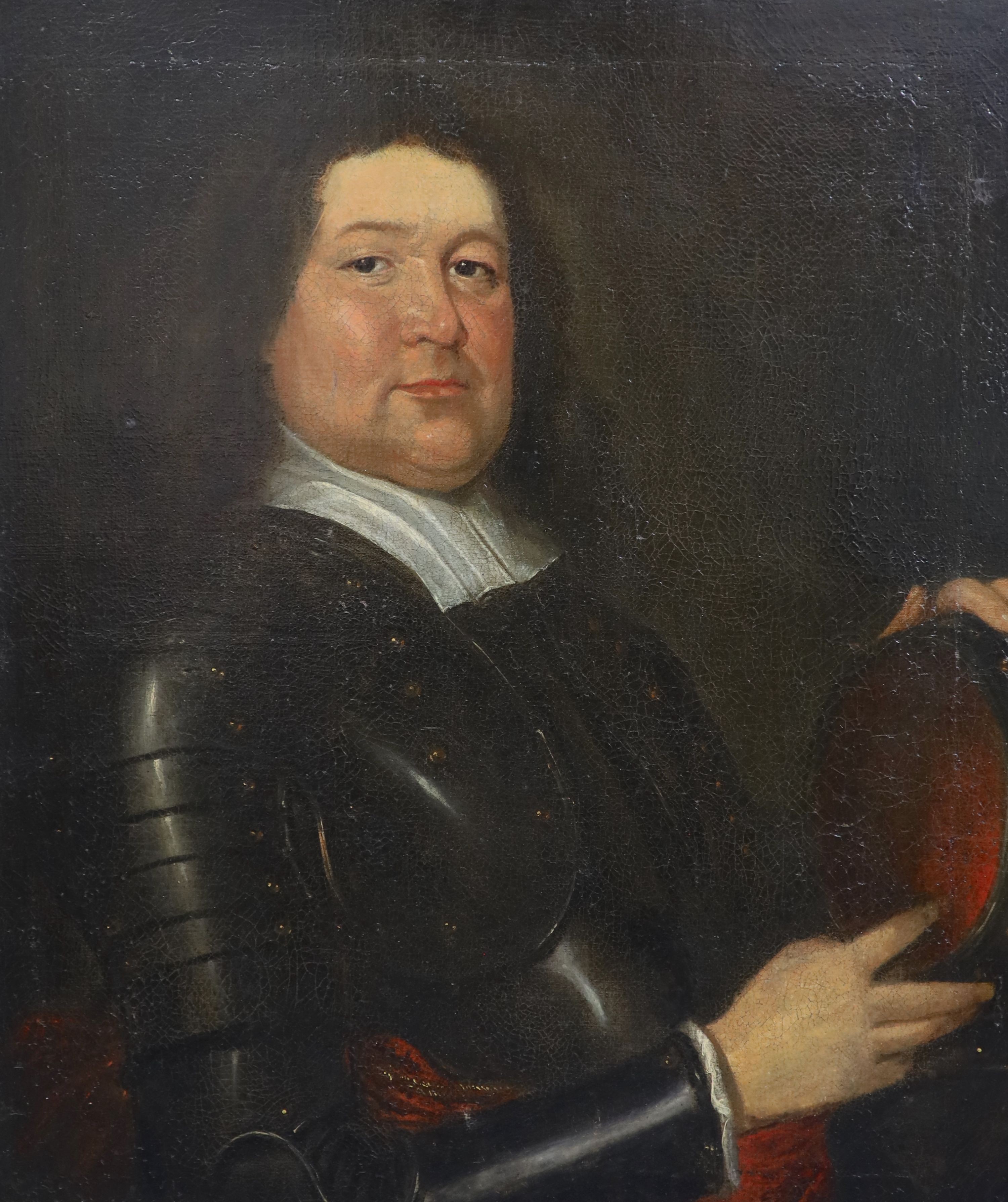 Follower of Gerrit van Honthorst (1590-1656), Portrait of a man in armour, oil on canvas, 74 x 62cm.